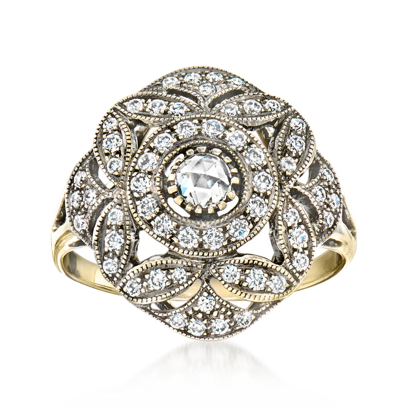 Vintage diamond flower ring in two-tone gold with round center stone