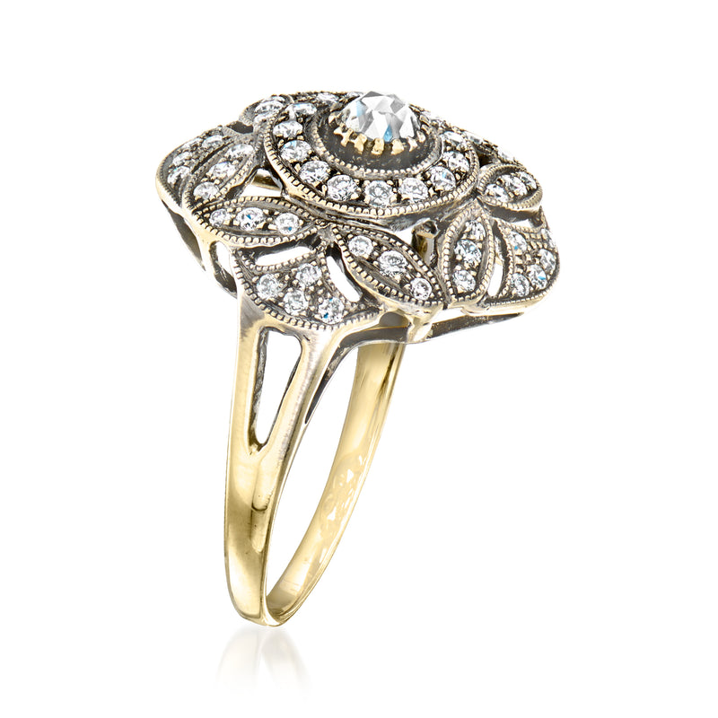 Vintage two-tone gold diamond flower ring, side view with raised center setting