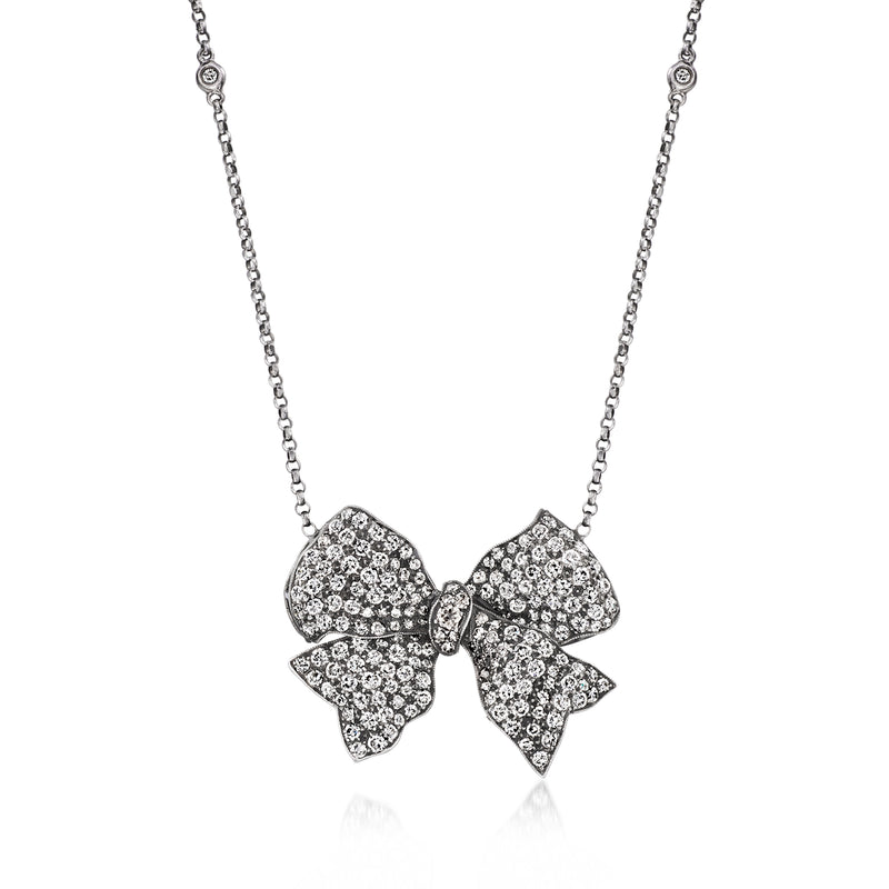 Diamond bow necklace with pavé bow pendant on platinum chain