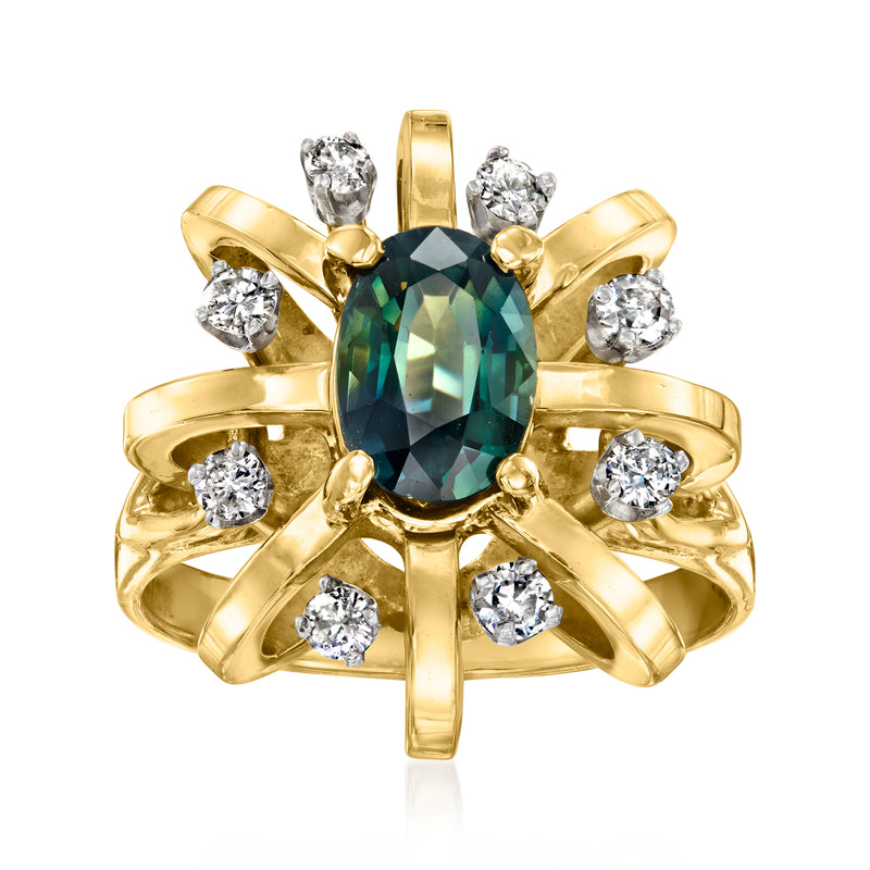 Yellow gold vintage ring with oval green sapphire center and diamond cluster accents