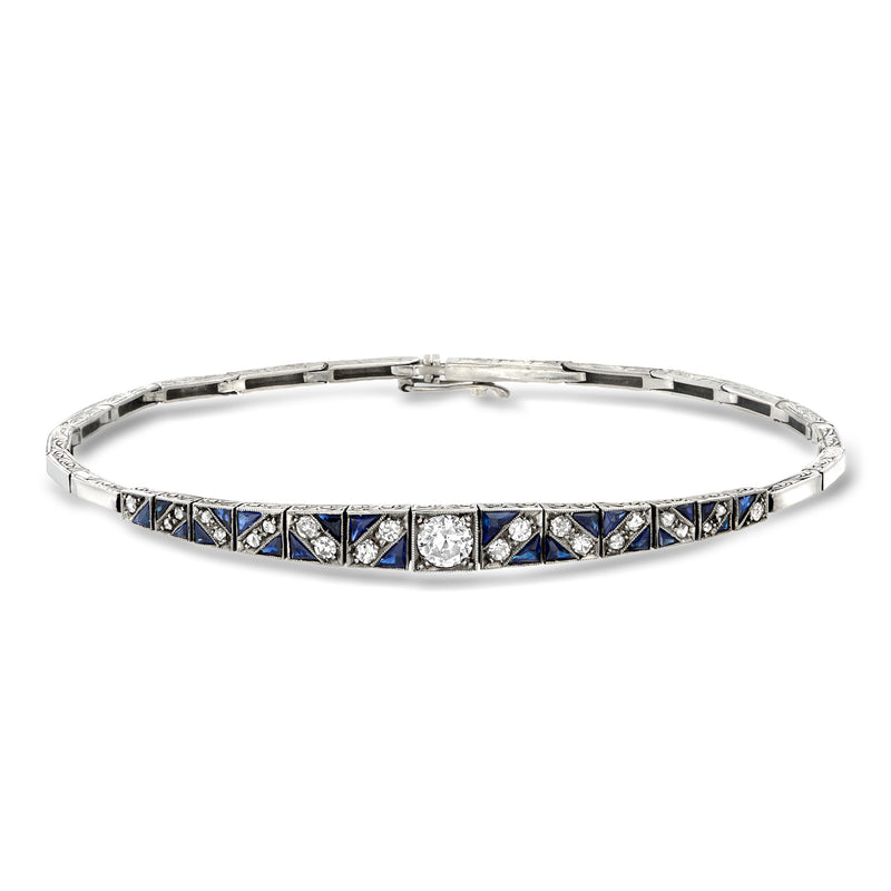 Vintage tennis bracelet in white gold with blue sapphires and white diamonds