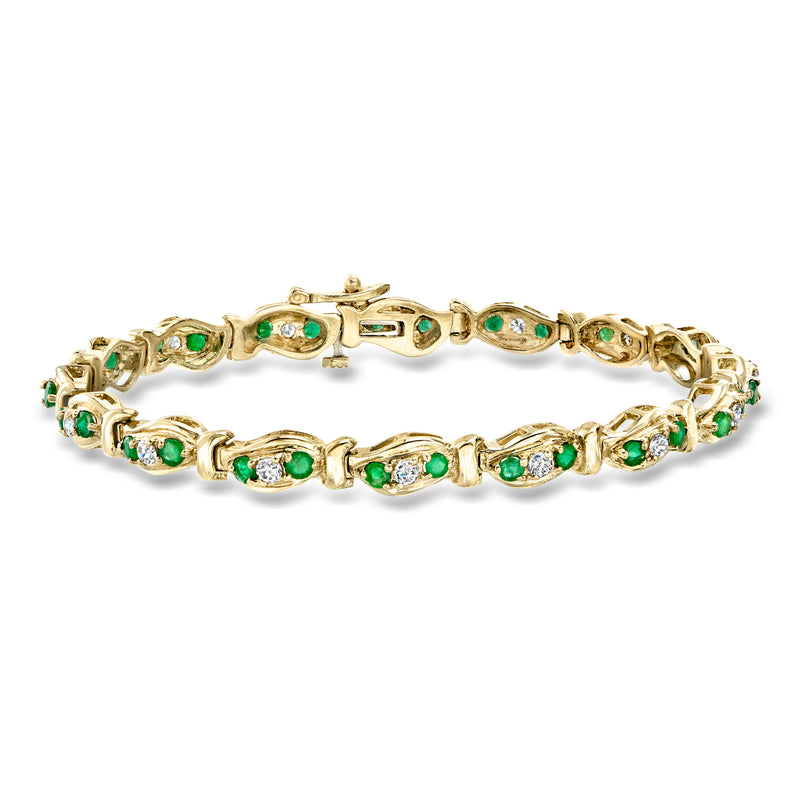 Vintage yellow gold link bracelet with green emerald and white diamond accents