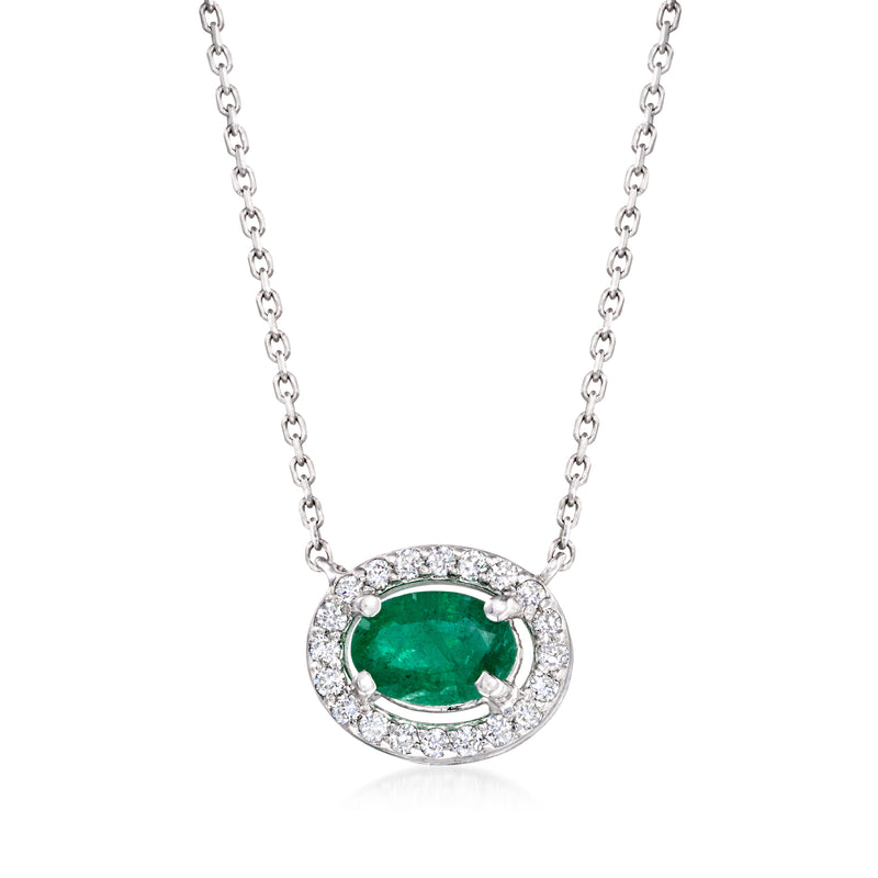 Oval emerald-green gemstone pendant with diamond halo on white gold chain