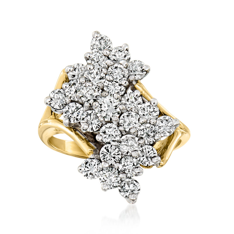 Vintage diamond cluster ring in 14kt yellow gold with marquise and round stones