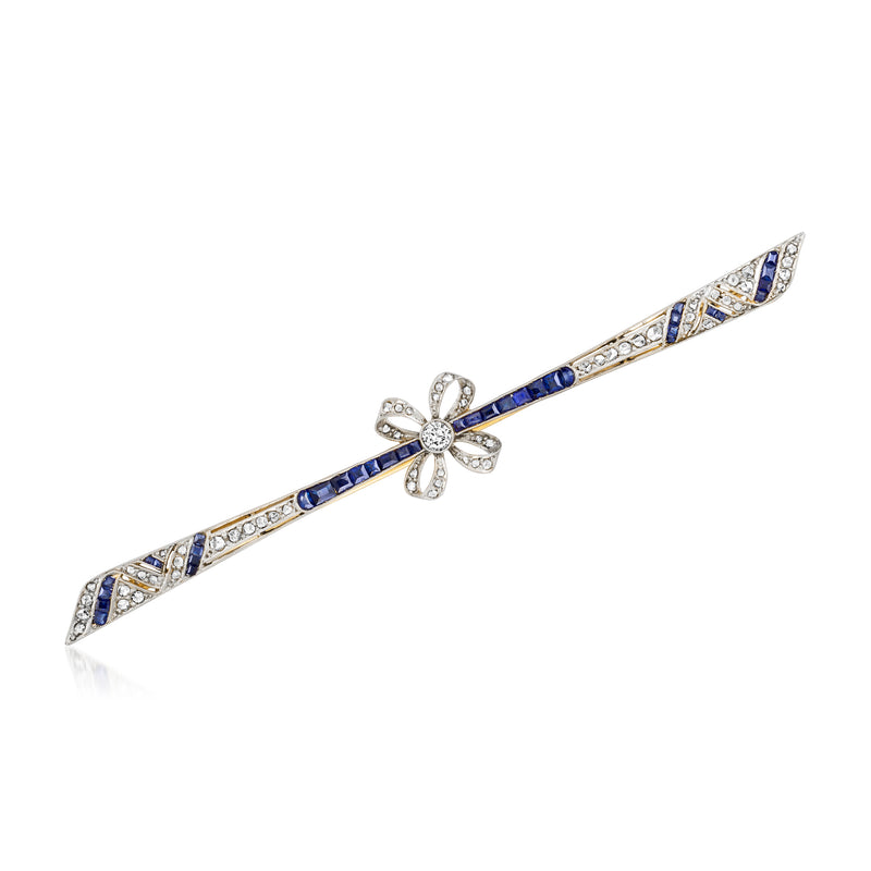 Vintage platinum and 18k yellow gold bar bow pin with sapphire and diamond accents