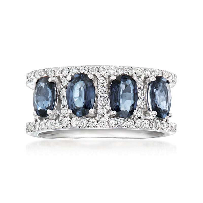 14kt white gold ring with three oval blue sapphires and diamond halo rows