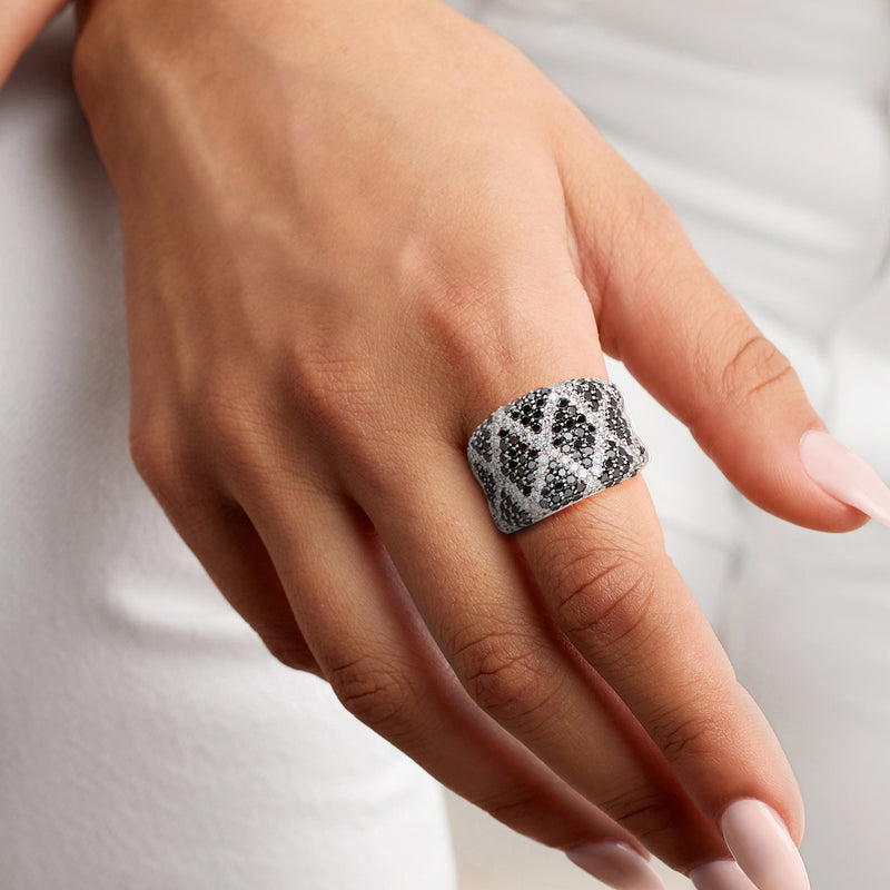 Vintage black and white diamond X ring in white gold