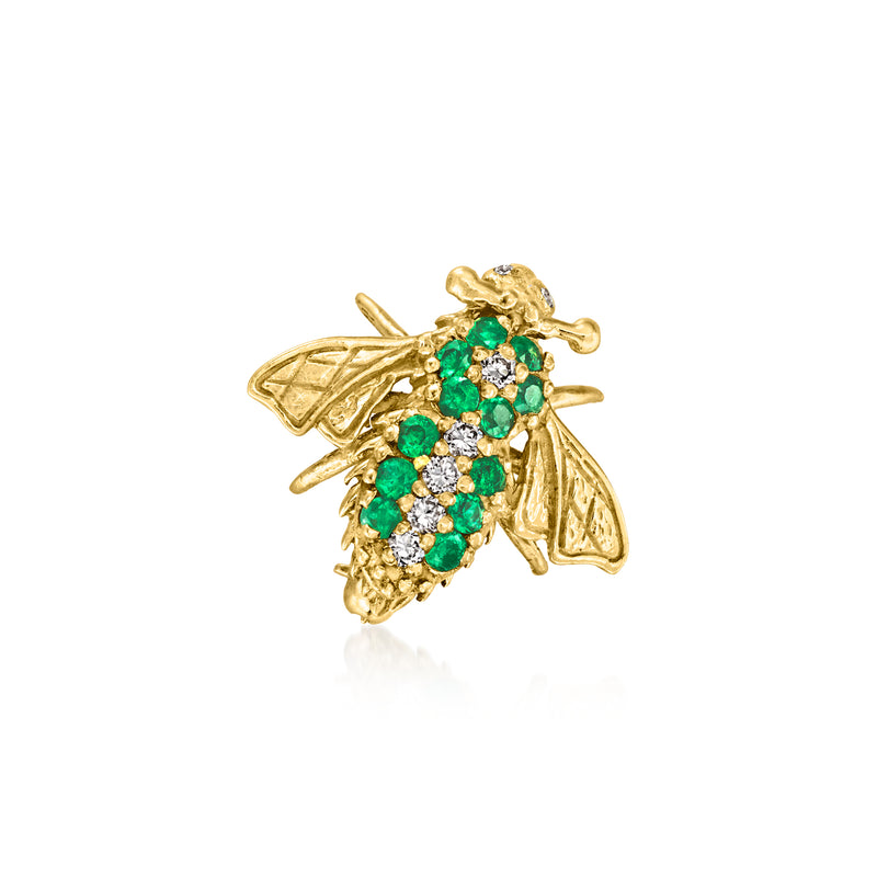 Gold-tone bee pin with emerald-green stones and small diamond accents
