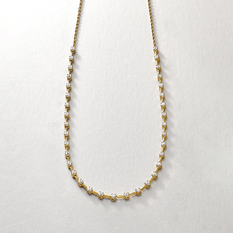Gold-tone diamond tennis necklace with evenly spaced round stones