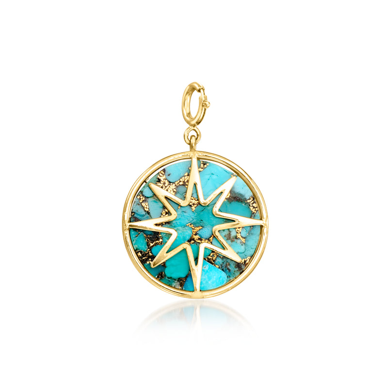 Gold compass charm pendant with turquoise enamel face and central crystal star.