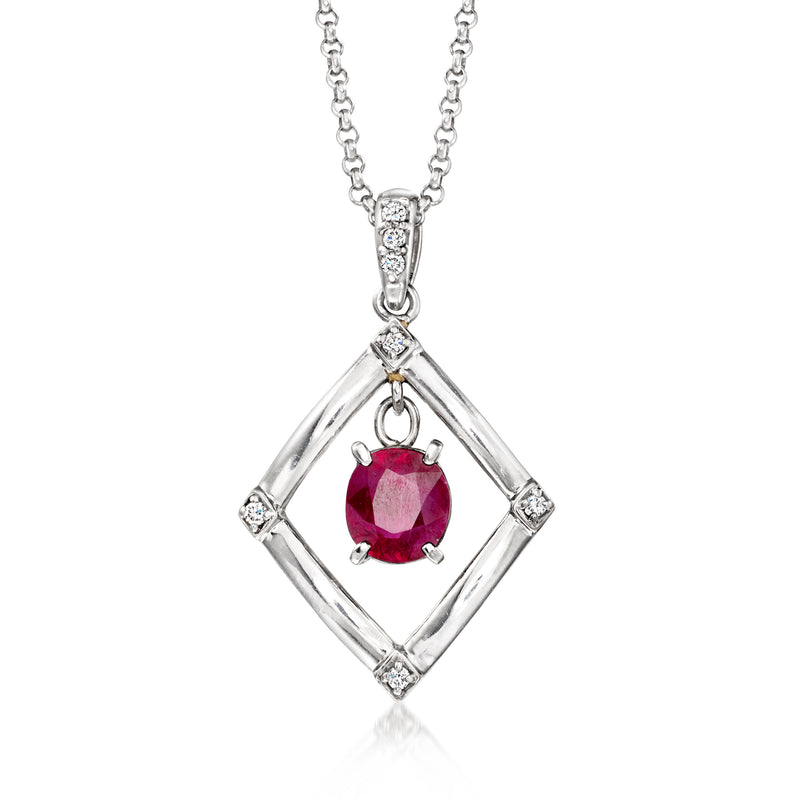 Platinum geometric pendant necklace with red ruby center and diamond accents