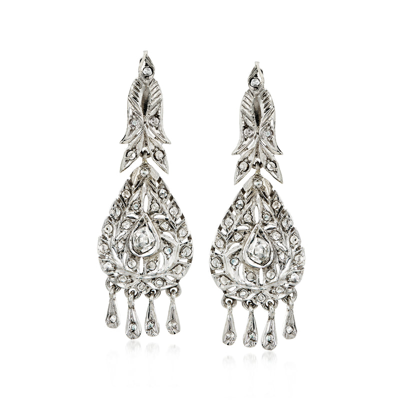 Sterling silver filigree drop earrings with teardrop design and dangling accents