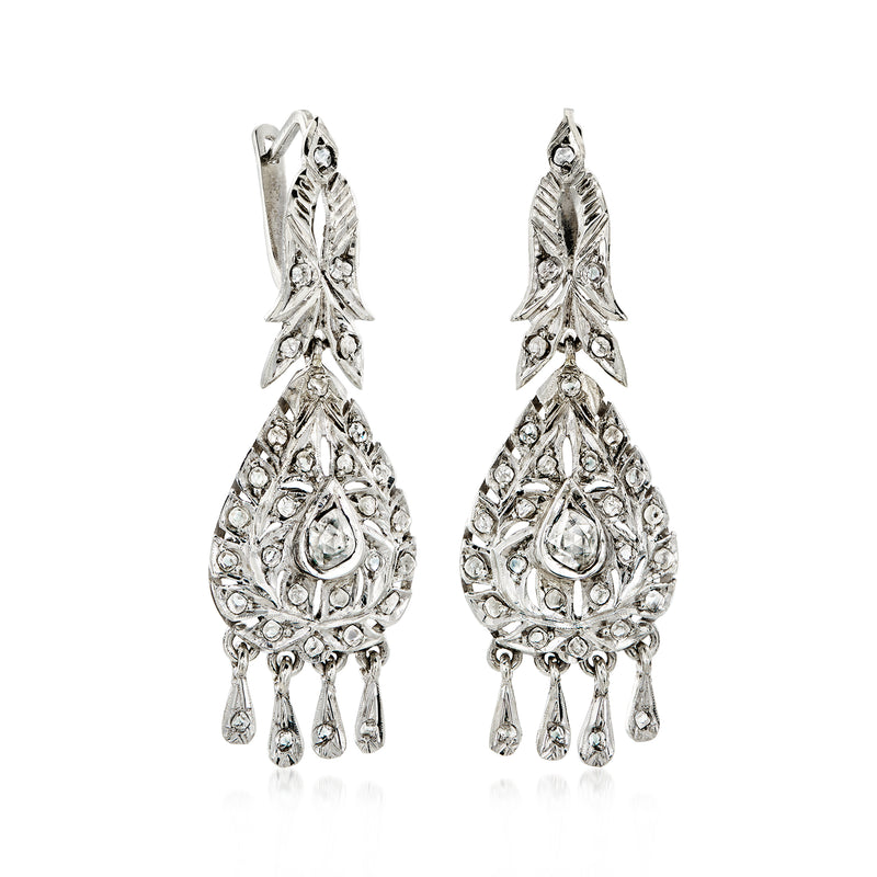Sterling silver teardrop filigree drop earrings with round stone details and fringe drops