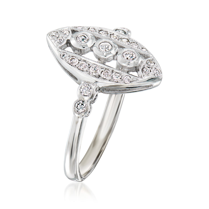 18kt white gold diamond openwork ring, arched top with bezel-set round stones