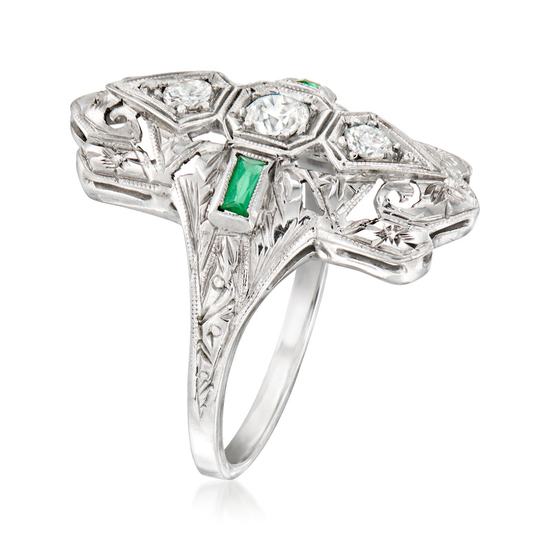 Vintage white gold filigree ring, side view, clear center stone with green square accents