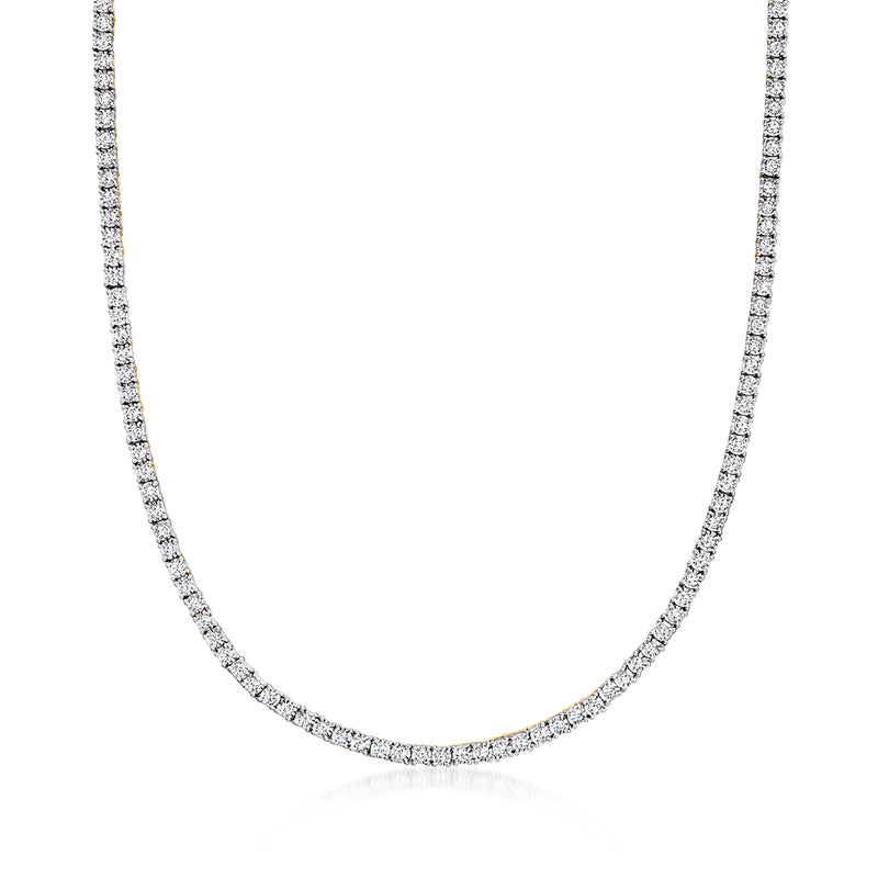 Gold over sterling diamond tennis necklace with linked round stones, curved chain