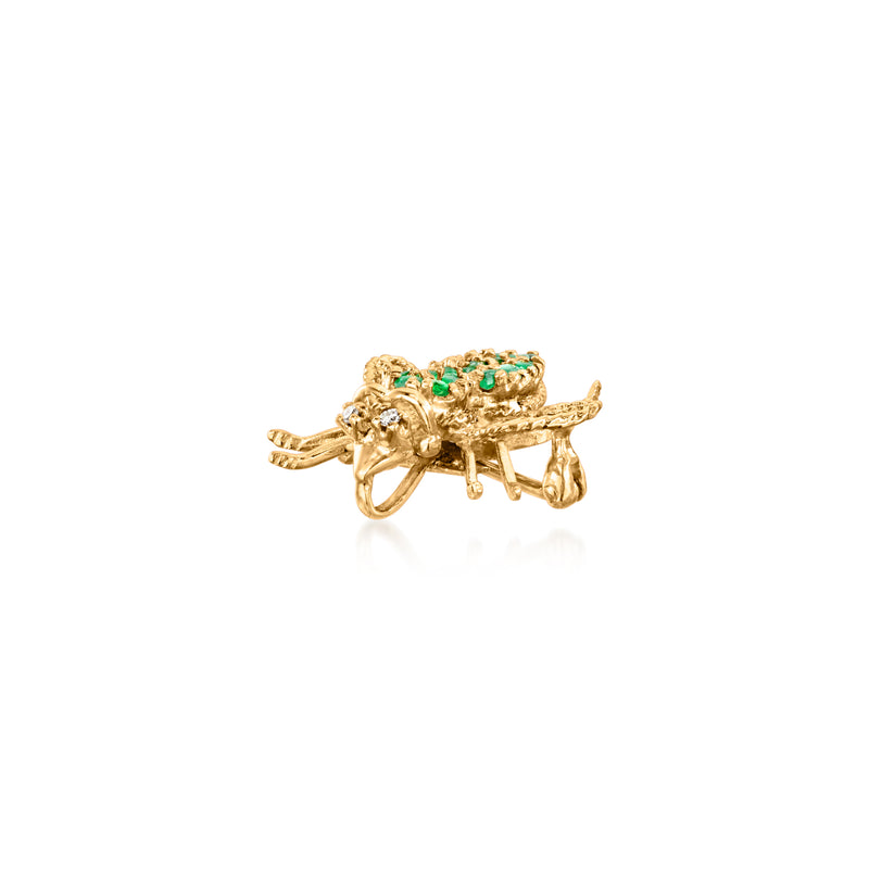Back of 14kt yellow gold bee pin with clasp and emerald accents