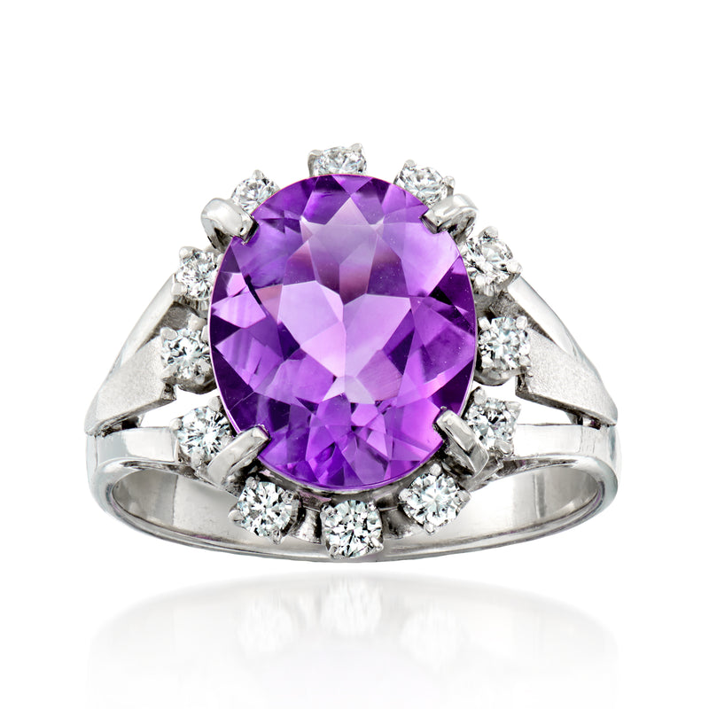 Oval amethyst gemstone ring in silver with diamond halo and prongs