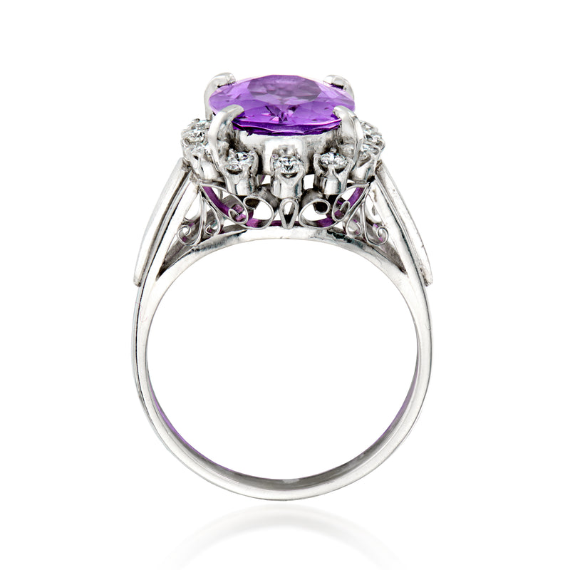 Reverse view of oval amethyst ring with diamond accents and prongs