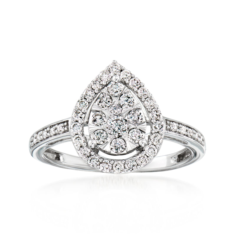 Teardrop diamond cluster ring in 14kt white gold with pave halo