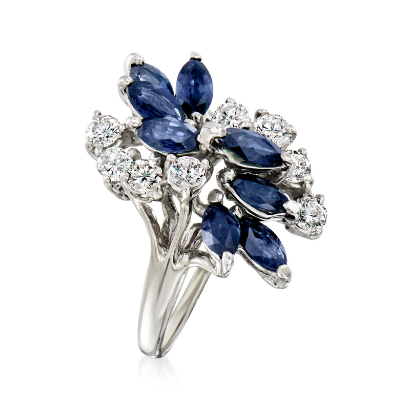 White gold marquise and pear sapphire cluster ring with round diamond accents