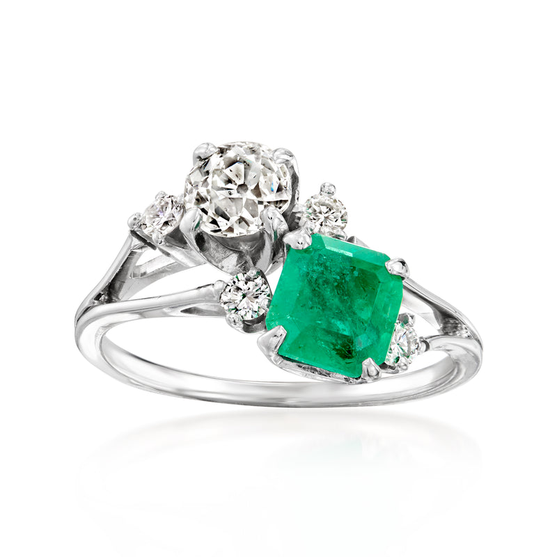 Vintage emerald and diamond ring in 18k white gold with emerald-green center stone