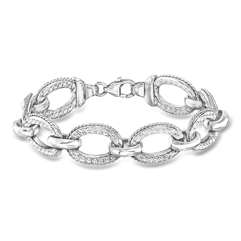 Rhodium-plated link bracelet with oval textured links and lobster clasp, silver tone