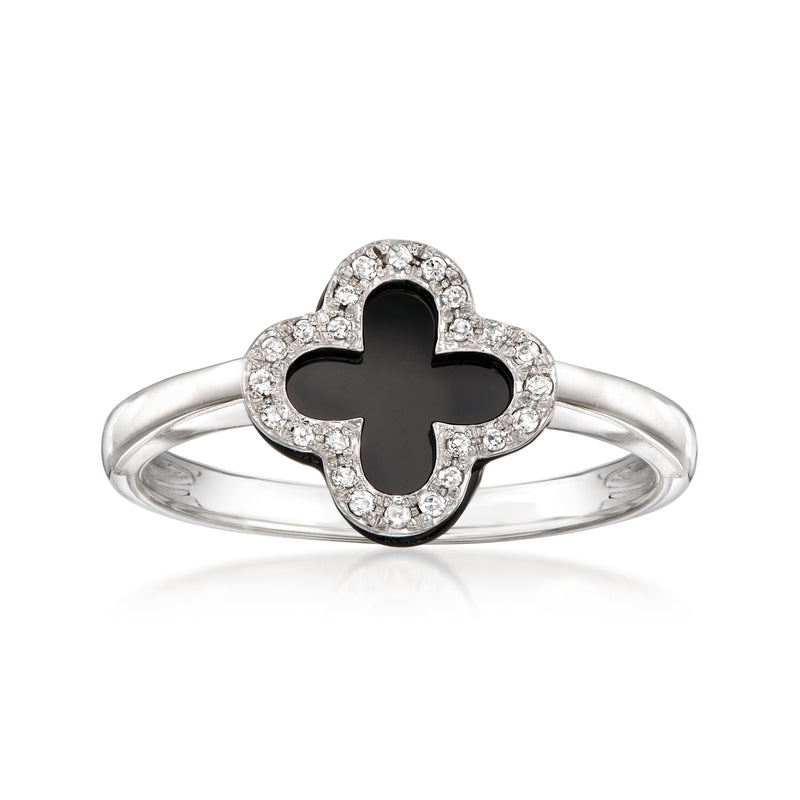 Onyx clover ring in 14kt white gold with diamond halo and black center setting