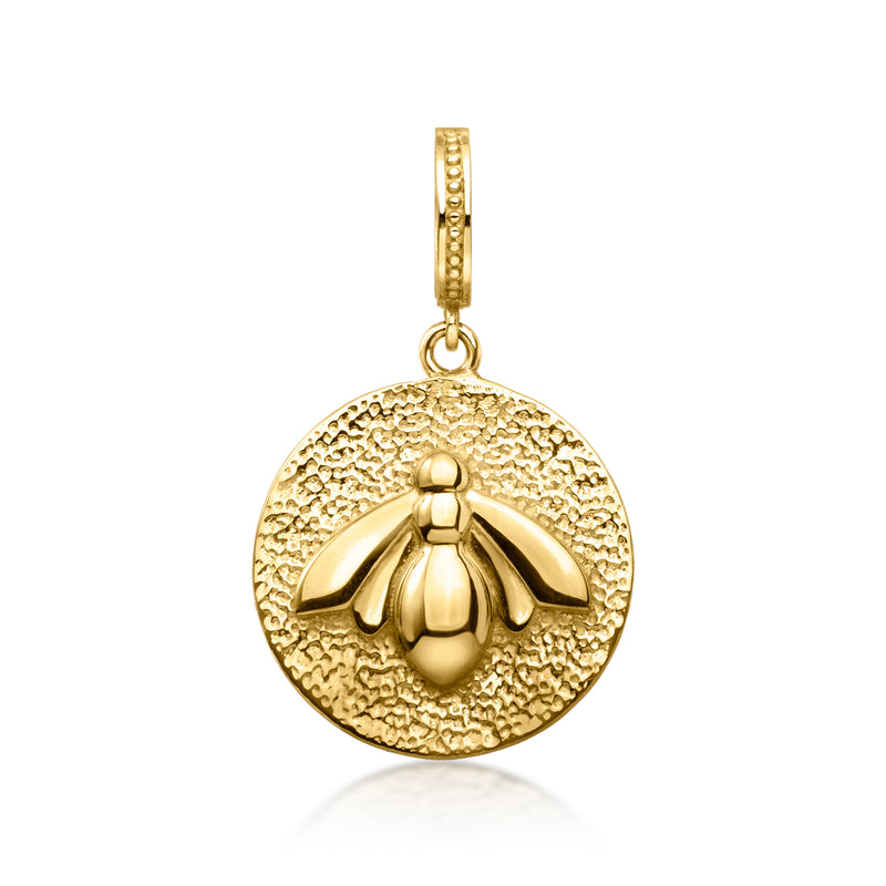 Gold-tone bee charm pendant with round textured disk and hanging loop