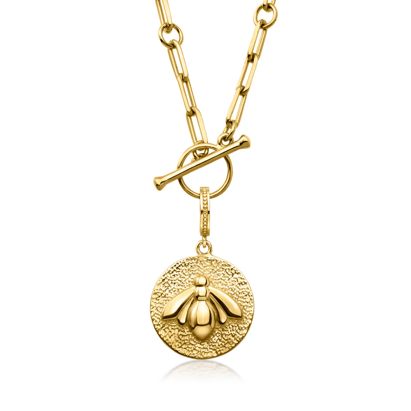 Gold bee charm pendant on linked chain, circular textured face with bee