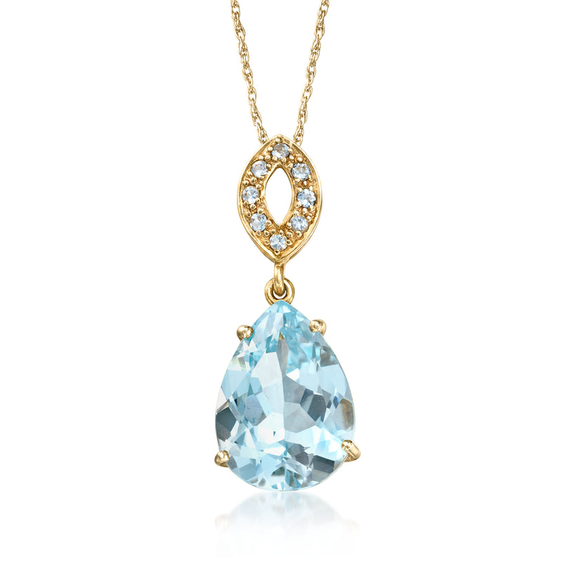 14kt yellow gold topaz pendant necklace with oval sky-blue stone and halo accents