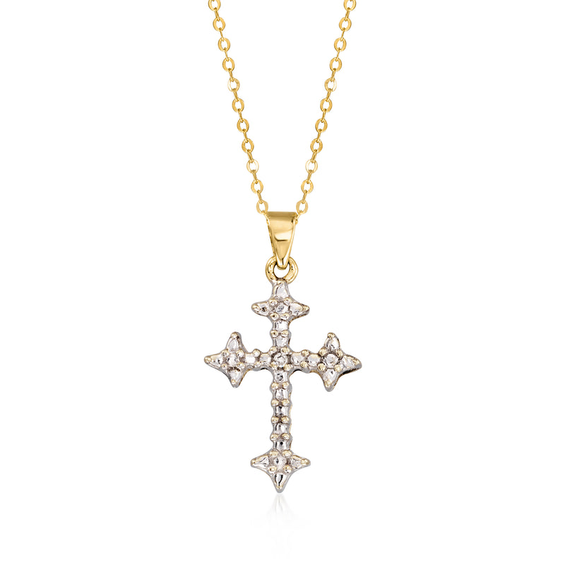 Two-tone gold cross pendant necklace with diamond accents on a gold chain