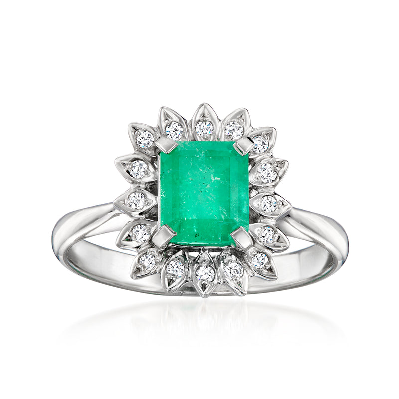 Platinum ring with square emerald center and diamond halo, prong-set around