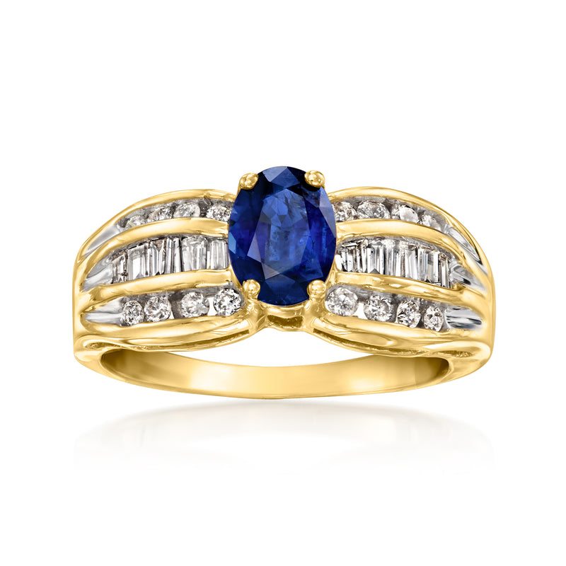 18kt yellow gold ring with oval blue sapphire center and baguette diamond accents