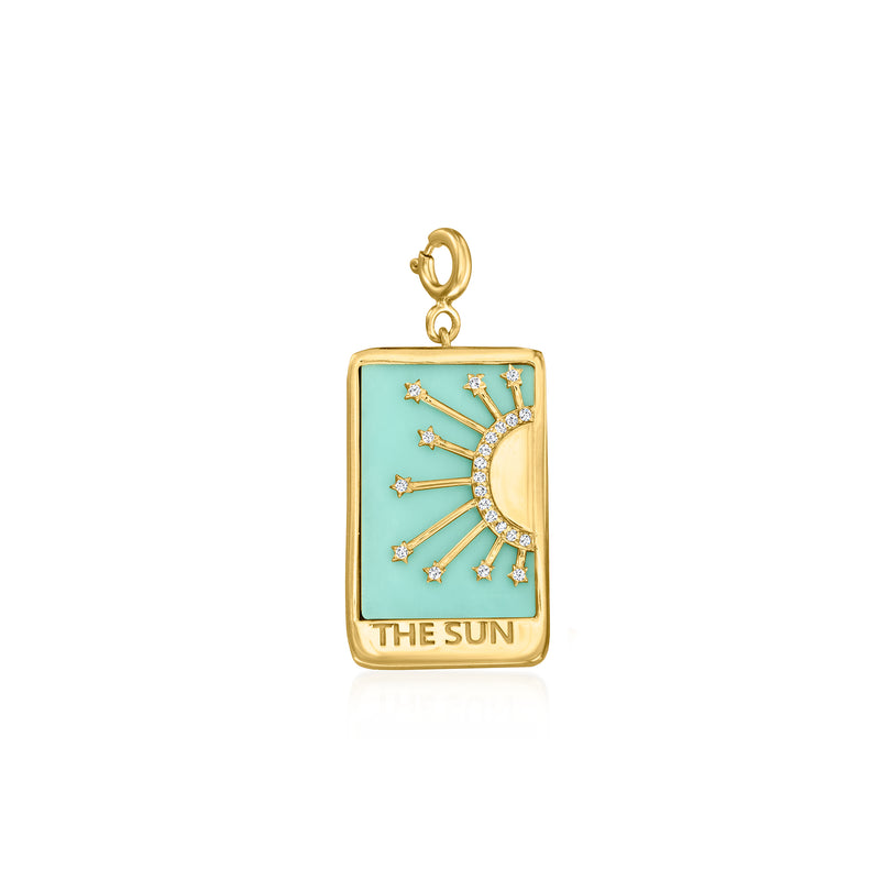 Gold tarot card charm with turquoise sunburst and white topaz accents