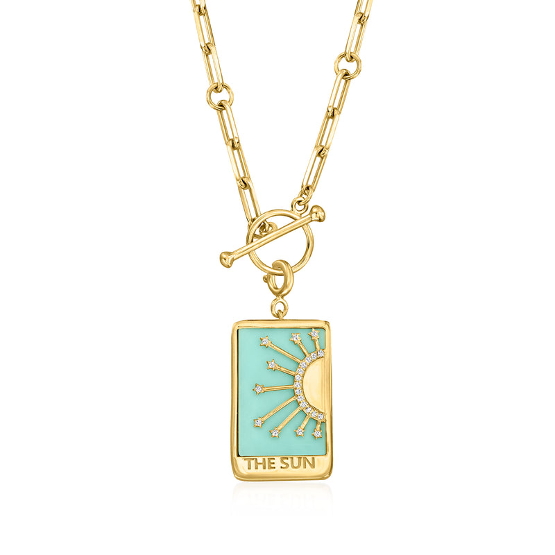 Gold necklace chain with turquoise tarot card charm featuring sunburst and stones