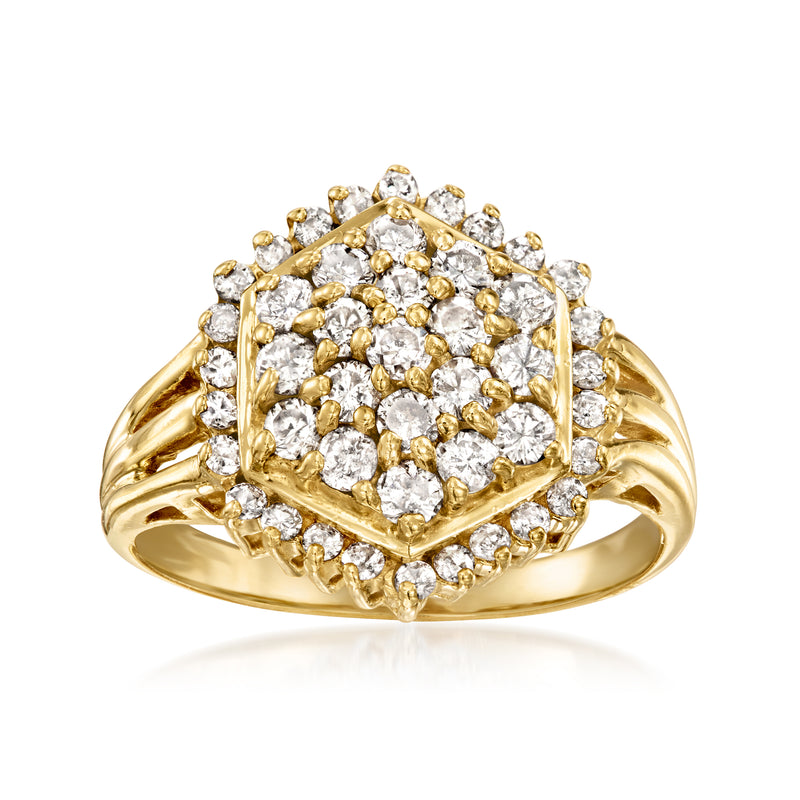 Vintage diamond cluster ring in yellow gold with marquise halo setting