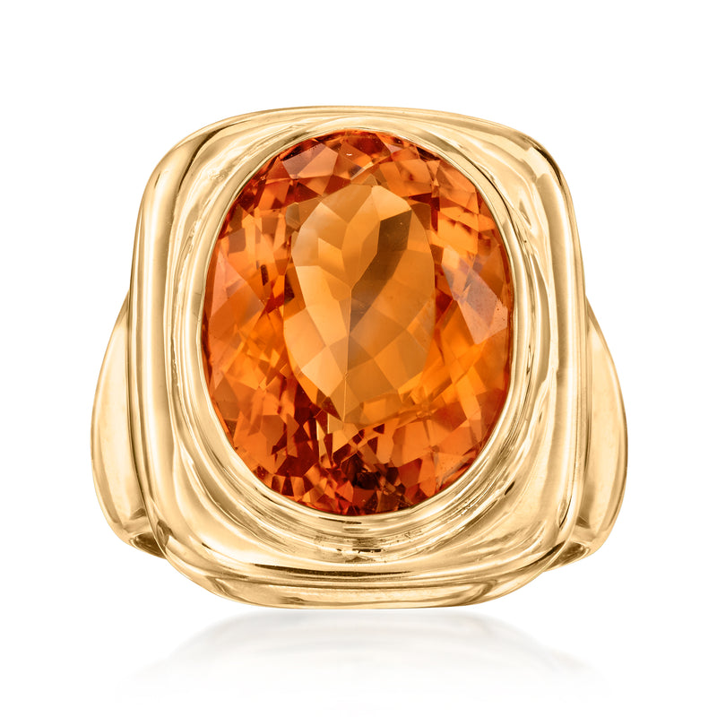 Vintage yellow gold ring with oval orange citrine gemstone, rope bezel setting