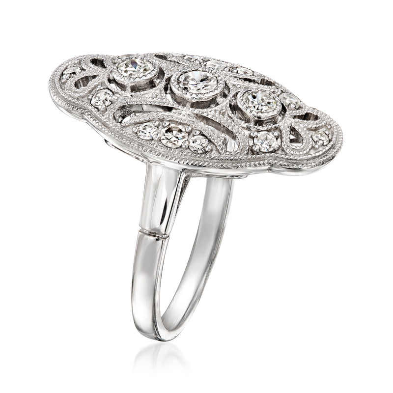 Vintage platinum diamond ring, side view of ornate oval openwork setting