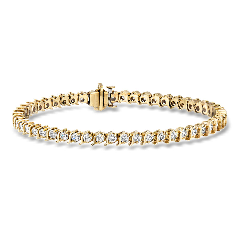 Yellow gold diamond tennis bracelet with S-link chain and round bezel stones