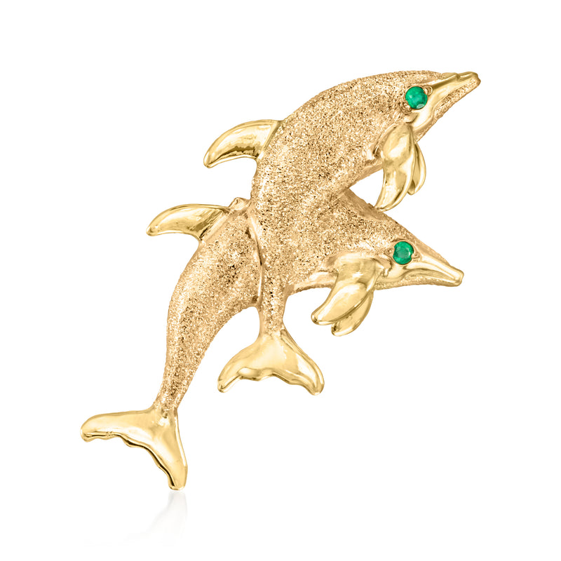 14kt yellow gold dolphin pin/pendant, textured surface with two emerald stones