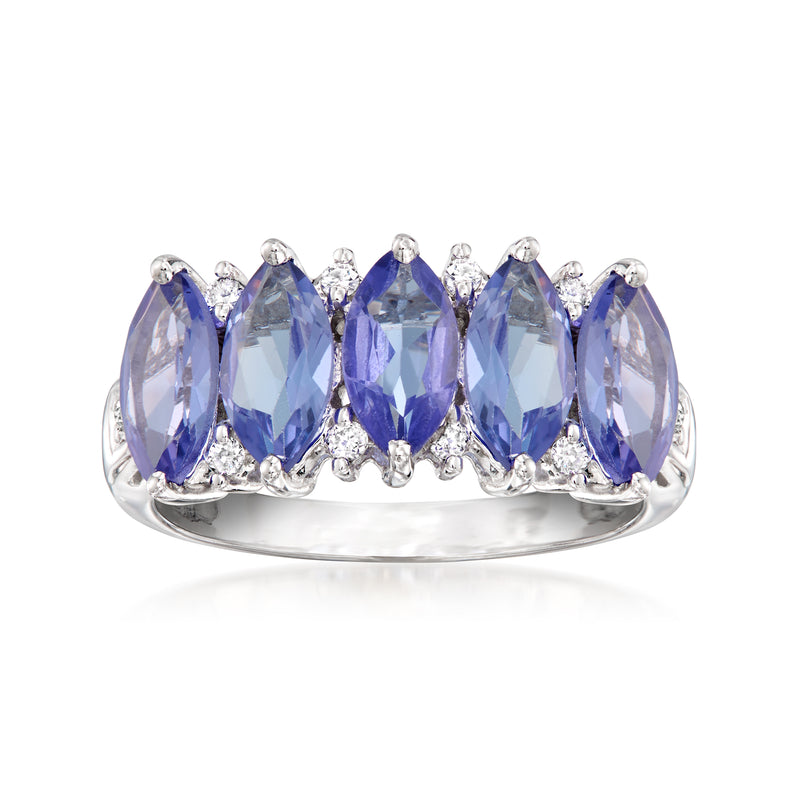 Blue tanzanite and diamond band ring in 14kt white gold, prong-set stones