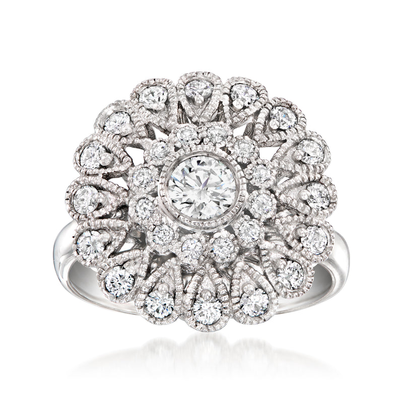 Vintage diamond flower ring in 18kt white gold with round cluster setting