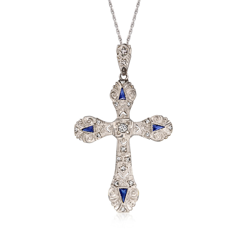 Cross pendant necklace in platinum with blue stones and diamond accents