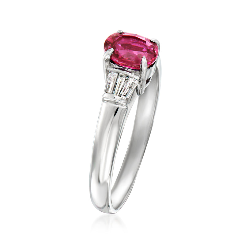 Platinum vintage ring with prong-set oval ruby and baguette side stones