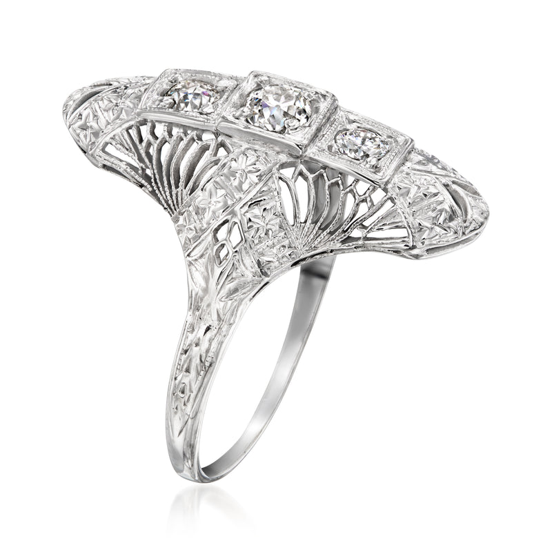 14kt white gold openwork diamond ring, side view with three square settings