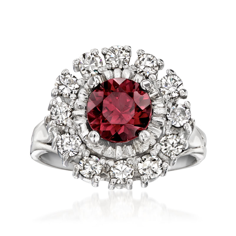 Platinum vintage ring with large round red rhodolite center and diamond halo