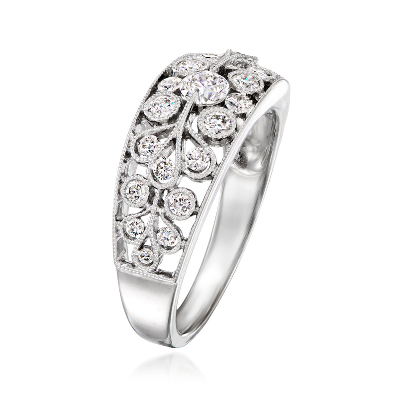 18kt white gold diamond openwork ring, side view with round clustered stones