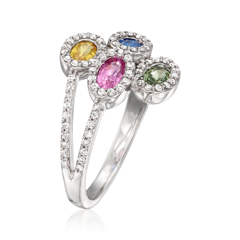 White gold ring with oval yellow, pink, blue and green sapphires framed by diamonds