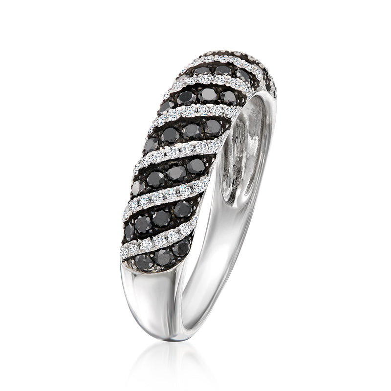 Side view of twisted white gold diamond ring with black and white stones